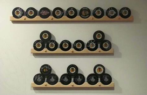 Puck shelf Hockey Decorations, Hockey Stick Furniture, Hockey Nursery, Awards Display, Hockey Puck Display, Display Hangers, Hockey Crafts, Hockey Bedroom, Hockey Decor