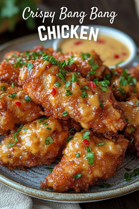 Savor the crunch of Crispy Bang Bang Chicken! This easy and delicious recipe features juicy chicken bites coated in a crispy crust, tossed in a creamy, spicy sauce. Perfect for a quick dinner or game day snacks. Everyone will love this tasty dish! Chris Cho Spicy Sweet Fried Chicken, Crispy Sweet Chili Chicken, Bang Bang Chicken Tenders, Crispy Bang Bang Chicken, Chicken Bang Bang Recipe, Crispy Chicken Tenders Recipes, Crispy Chicken Bites Recipes, Cubed Chicken Recipes, Crispy Baked Chicken Breast