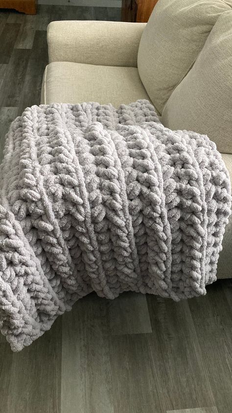 12 Hour Luxurious Crochet Chunky Blanket Pattern: Easy & Big! This easy and luxurious chunky crochet blanket pattern is perfect for those who want a quick and cozy project. We also offer free and paid crochet patterns on a variety of topics.. #Fluffy_Blanket_Crochet_Pattern #Chunky_Crochet_Throw_Pattern_Free #Chunky_Crochet_Baby_Blanket_Pattern_Free #Crochet_Blanket_Fluffy Crochet Blanket Yarn Sweater, Huge Crochet Blanket, Crochet Fluffy Blanket, Crochet Room Ideas, Fluffy Crochet Blanket, Bulky Yarn Crochet Patterns Blanket, Thick Crochet Blanket, Bernat Blanket Yarn Patterns Crochet, Grey Crochet Blanket