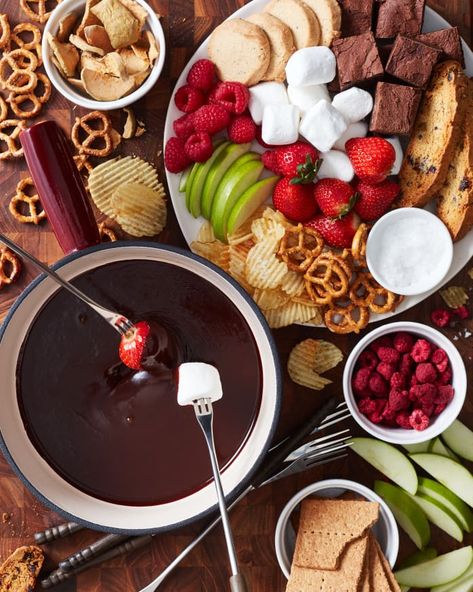 How to Make Easy Chocolate Fondue | Kitchn Fondue Dinner, Chocolate Fondue Recipe, Fondue Night, Fondue Party, Fondue Recipes, Peanut Butter Pretzel, Freeze Dried Fruit, Wafer Cookies, Banana Chips