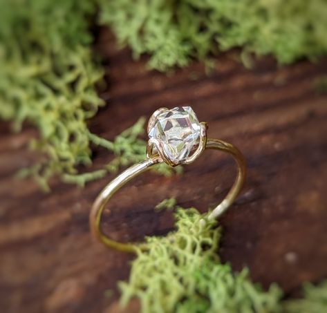 A sparkly crystal clear Herkimer diamond set by petal prongs on a Solid 18k Gold band Diamond Engagement Ring Gold, Herkimer Diamond Ring Engagement, Raw Stone Engagement Rings, Rough Diamond Engagement Ring, Raw Diamond Ring, Rough Gemstone Ring, Crystal Engagement Rings, Raw Diamond Rings, Raw Diamond Engagement Rings