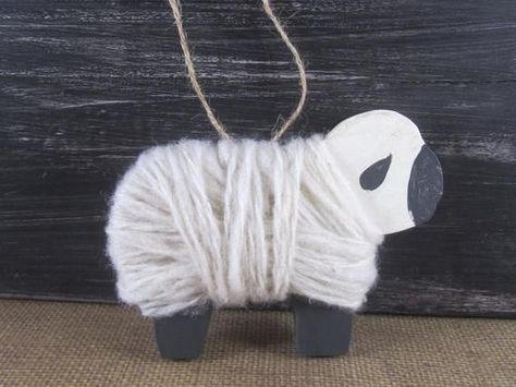 Handmade Christmas Ornament - Wooden Sheep  This adorable folk art Christmas tree ornament was hand painted and wrapped with hand-spun wool from our sheep.  It has been aged to look old.  The sheep measure about 3 1/4 tall and 4 1/2 long.  #handmadechristmas | DoodleDogPrimitives.com Goat Crafts, Folk Art Christmas Tree, Wooden Sheep, Christmas Primitive Decor, Primitive Sheep, Folk Art Christmas, Art Christmas Tree, Sheep Crafts, Mesh Wreath Diy