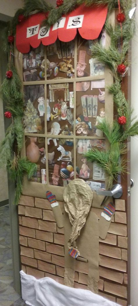 Christmas Office Door Decorating Contest....Vintage Toy Store Window UPDATE: I decorated this door in 2016 and the most important thing was that I spent less than $10 on materials. I still look at it and love it!  #Christmas #lilsbasket #officedoor #vintagetoys #frenchwindow Toy Shop Door Decoration, Vintage Christmas Door Decorations, Office Christmas Decorating Contest, Christmas Village Door Decorating, Door Decorating Contest Christmas Office, Office Christmas Door Contest, Christmas School Door, Christmas Office Door Decorating Contest, Office Door Decorating Contest