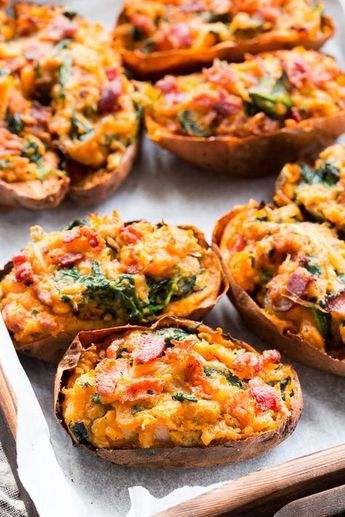 These twice baked sweet potatoes can be served as a healthy meal or side dish - your choice! They're packed with a savory mixture of caramelized onions, spinach and bacon and baked to perfection. They're family approved, Paleo, Whole30 compliant, and dairy-free. Paleo Running Momma, Spinach And Bacon, Twice Baked Sweet Potatoes, Baked Sweet Potatoes, Sweet Potato Skins, Twice Baked, Paleo Diet Recipes, Recipe 30, Baked Sweet Potato