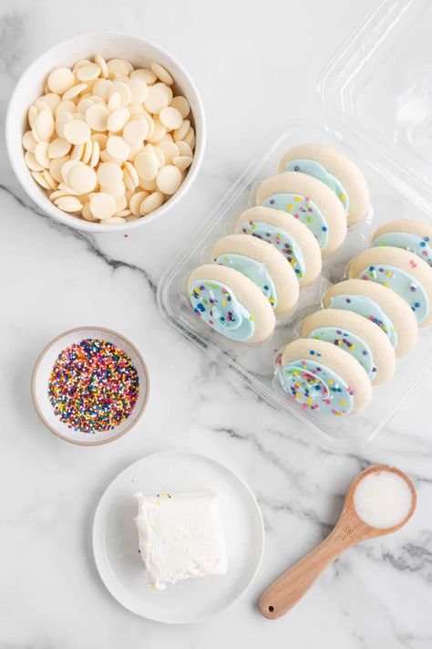 Cookie Dough Cake Pops are one of our favorite treats! Not only are they delicious, but they're also perfect for all sorts of holidays, special occasions, and even just because. It's a quick and easy recipe that will soon become one of your favorite no-bake desserts! | lofthouse cookie cake pops | lofthouse sugar cookie cake pops | lofthouse cookie cake balls | how to make cookie dough cake pops recipe | sugar cookie dough cake pops Cake Pops Using Cookies, No Bake Cake Pops 3 Ingredients, Cake Pops Cookies, Cookie Cake Pops Recipe, Cake Pops Recipe With Cookies, Cake Pops Out Of Cookies, No Bake Cake Pops Recipe, Cake Pops With Cookies, Make Cake Pops