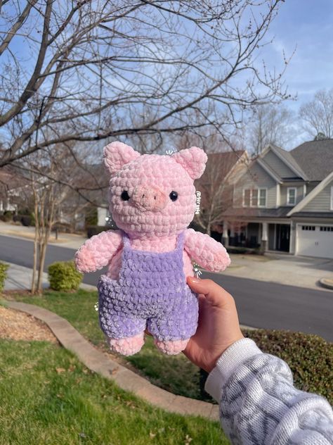 I am so excited to release my Milo the Pig crochet pattern! It was made entirely by me, and if you plan on using this pattern please make sure to credit me and share your creation on social media! This is a digital PDF pattern that includes instructions on how to crochet a pig with removable overalls! The file will be available for download on Etsy once purchased! Otherwise, you can find the digital download in your Etsy purchases tab. It has been tested, however, if you have any questions, comments, or concerns, feel free to message me via email or Instagram (@turoole). Pattern is worked in the round & written in English.  Level: Advanced Beginner to Intermediate Materials: - Super bulky yarn - crochet hook  -Safety eyes and/or fine black yarn -Yarn Needle  -Scissors - Stuffing If you are Crochet Stuffed Pig Free Patterns, Free Pig Crochet Pattern, Crochet Pigs, Crochet Pig Amigurumi, Pig Crochet Pattern, Pig Crochet, Pig Crochet Pattern Free, Crochet Pig Pattern Free, Bulky Yarn Crochet