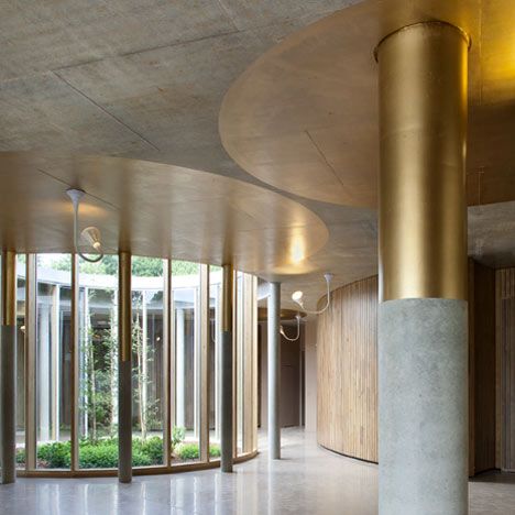 A crematorium in Rennes, France, featuring a series of circular structures surrounded by a ring of granite blocks. Columns Interior, Column Cladding, Column Ideas, Columns Decor, Rennes France, Round Column, Architectural Columns, Corridor Design, Interior Columns