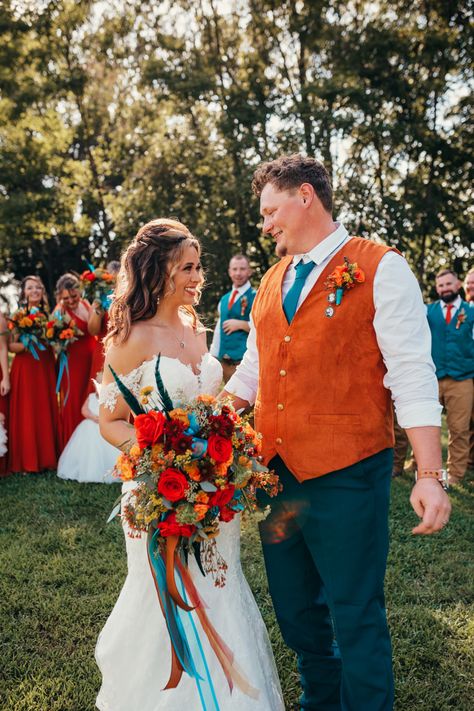 Teal Orange And Cream Wedding, Western Wedding Flowers Turquoise, Teal And Rust Wedding Groomsmen, Purple Teal Orange Wedding, Navy Teal Orange Wedding, Dark Teal And Rust Orange Wedding Party, Teal And Coral Fall Wedding, Rust And Teal Wedding Colors, Teal Blue And Orange Wedding