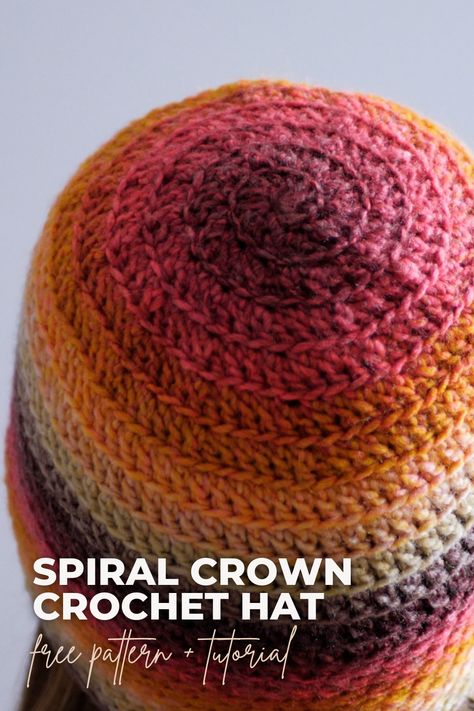 If you’re looking for a quick and easy hat that’s still interesting enough to crochet, this is a great place to start. The crown of this hat spirals around, revealing a pretty texture that looks great with a variety of yarns. #BHooked #Crochet #HowToCrochet #CrochetPattern #CrochetTutoial #CrochetHat #CrochetProject Crochet Hats Free Pattern Spiral, Crochet Hats Free Pattern In The Round, Magic Circle Hat Crochet, Spiral Crochet Hat Pattern Free, Crochet Spiral Beanie Pattern Free, Spiral Beanie Crochet Pattern, Spiral Crochet Hat, Crochet Spiral Hat, Crochet Hat In The Round