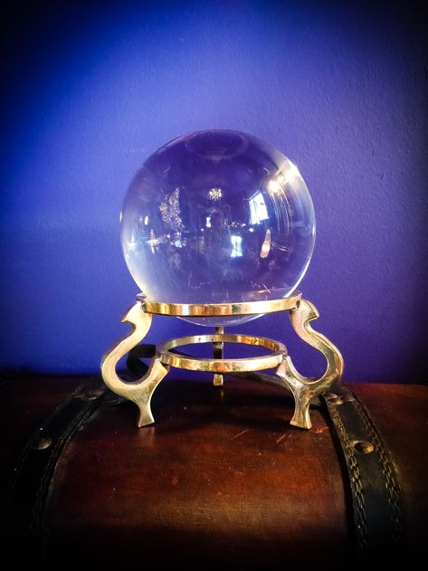 Crystal Ball & Vintage Stand // This beautiful crystal ball comes with a 1960’s vintage brass stand.  A crystal ball, also known as an orbuculum, is a crystal or glass ball and common fortune telling object. It is generally associated with the performance of clairvoyance and scrying in particular. Senior Hoodies, Halloween Crystal Ball, Fantasy Objects, Crystal Gazing, Crystal Ball Stand, Witches Cottage, Celtic Druids, Random Vintage, Backpack Art