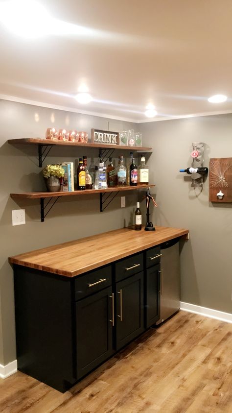 Basement bar homemade counter and exposed shelves Dry Bar For Basement, Basement Counter Bar Ideas, Basement Bar Small Space, Bar Area In Garage, Small Bars For Basements, Small Space Break Room, Small Bar Ideas For Basement, Butcher Block Basement Bar, Bar Remodel Ideas Basement