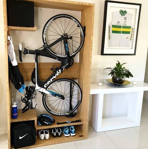 11 Indoor Bike Storage Ideas You'll Love (Small Spaces) | GoDownsize Indoor Bike Storage Small Spaces, Bike Storage Small Space, Bike Storage Ideas, Bike Storage Home, Fitness Corner, Bike Storage Room, Bike Storage Apartment, Bicycle Storage Rack, Open Cupboard