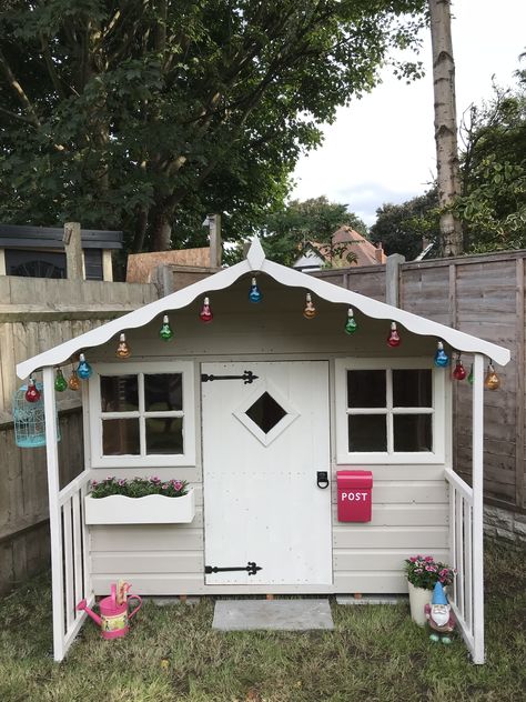 •Playhouse - Shire Cubby •Paint - Cuprinol in Natural Stone and Pale Jasmine  •Solar lights - Clas Ohlson •Post box - Bruka Design Pale Jasmine Cuprinol, Shire Playhouse, Outdoor Playhouse Paint Ideas, Wooden Playhouse Makeover Interior, Painted Wooden Playhouse, Playhouse Exterior Paint Ideas, Painted Wendy House, Wendy House Paint Ideas, Wooden Playhouse Paint Ideas