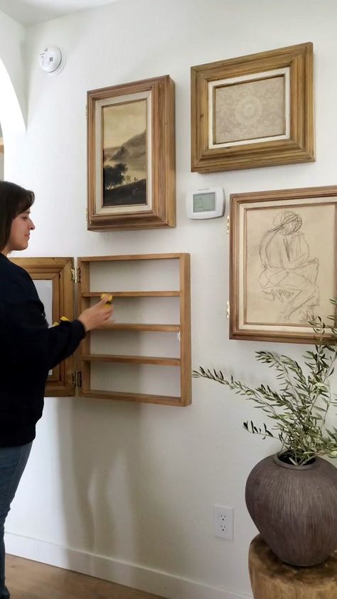 This DIY Art frame hidden storage cabinet is truly the best storage/sa... | picture frame hidden storage | TikTok Hidden Art Storage, Picture Frame As Cabinet Door, Picture Hidden Storage, Hidden Shelf In Wall, Picture Frame Hidden Storage Diy, Frame Hidden Storage, Picture Frame Cabinet, Hammer And Nail, Hinged Picture Frame