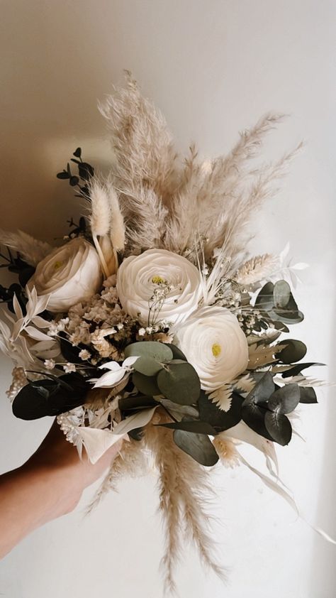 Green And White Bridal Bouquet Dried Flowers, Eucalyptus And Dried Flowers Bouquet, Champagne Bridal Party With Warm Flowers, Dried Flower Bridal Bouquet Eucalyptus, Bridal Boho Flowers, Dried White Wedding Flowers, Creams And Whotes Wedding Flowers, White Dried Flower Bouquet Wedding, Bridal Flowers Ivory