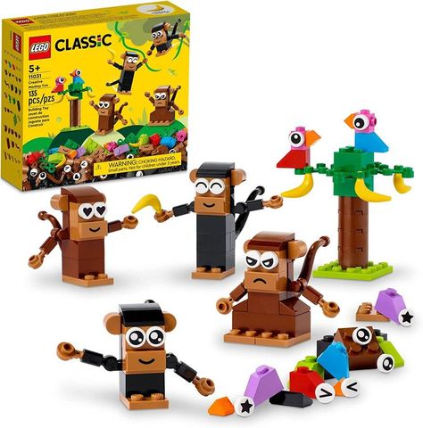 Jungle animal toy – LEGO Classic Creative Monkey Fun (11031) is packed with hands-on play possibilities to engage, entertain and inspire kids Ages 5 and up. Lovable characters – Kids assemble 4 monkeys using an assortment of bricks, expressive eye decorations and smile/frown tiles. The set also includes 4 bananas, 2 buildable birds and a buildable tree. Eye Decorations, Best White Elephant Gifts, Monkey Gifts, Kids Create, Buy Lego, Lego Creator, Cute Monkey, Building For Kids, Toys R Us