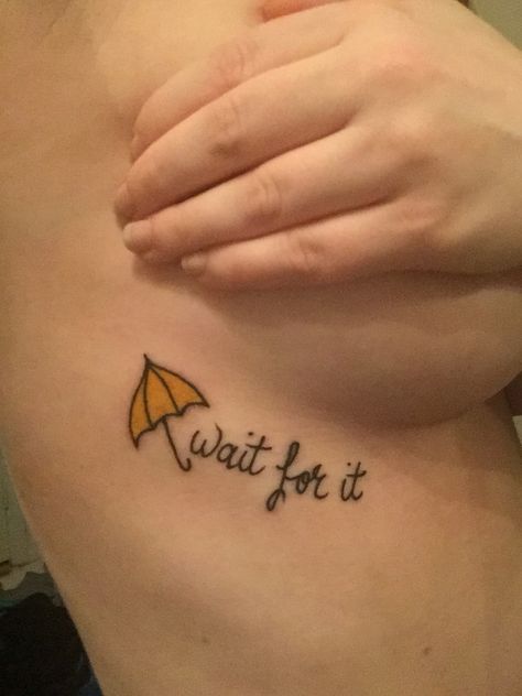 How I met your mother tattoo. Yellow umbrella. Wait for it. Rib tattoo. HIMYM Tv Inspired Tattoos, Wait For It Tattoo, Yellow Umbrella Tattoo, Himym Tattoo Ideas, How I Met Your Mother Tattoo, Himym Tattoo, Umbrella Tattoo, Yellow Umbrella, Mother Tattoos