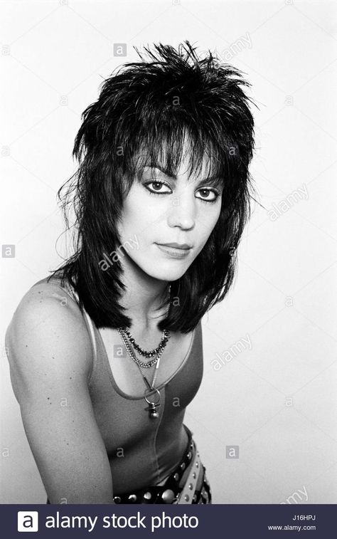 Download this stock image: Joan Jett photographed in Philadelphia, PA, June 1984. © mpi09 / MediaPunch - J16HPJ from Alamy's library of millions of high resolution stock photos, illustrations and vectors. 80s Shag Hairstyles, 80s Shag, Joan Jett Hair, Joan Jett Style, Jet Hair, 80s Mullet, Joan Jett And The Blackhearts, Punk Rock Girls, Black Haircut