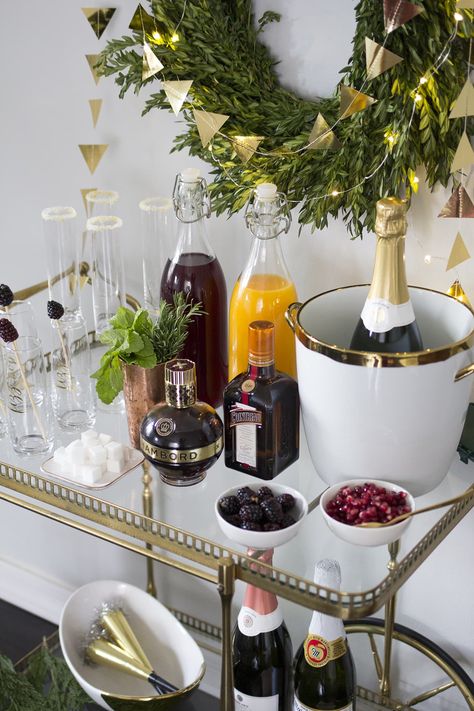 Setting up a New Years Eve Champagne Bar Bar Cart Ideas, Nye Celebration, Winter Entertaining, Tangerine Juice, 37th Birthday, Champagne Drinks, Champagne Cocktails, Gold Bar Cart, Cart Ideas