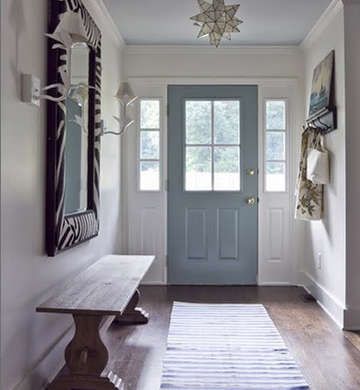 Whether you're trying to sell a home or just make one look uniquely yours, an attractive exterior can seriously boost curb appeal. While the overall color of a house may need to be neutral to fit in with the neighborhood, the front door is a focal point that’s prime for self-expression. Here are 10 great front door paint colors, from classic to courageous, sure to give a house more street cred. Accent Hallway, Main Kitchen, Hallway Light, Cute Farmhouse, Front Door Paint Colors, Bedroom Corridor, Shade Design, Modern Construction, Entry Ways