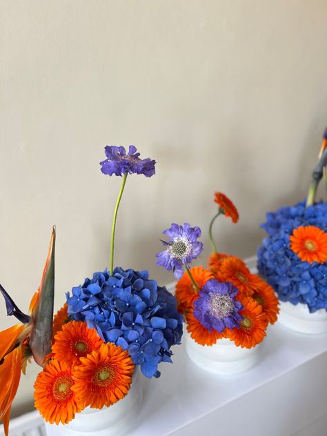 Blue & orange event flowers Orange And Blue Flower Arrangements, Sprinkle Decor, Blue Flower Arrangements, Event Florals, Baby Favors, Flower Bar, Baby Shower Flowers, Event Flowers, Flower Ideas