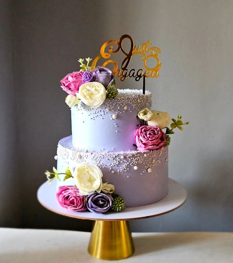 Lavender ❤️ A whipped cream engagement cake in pineapple and chocolate filling. #engagementcake #weddingcake #anniversarycake #customisedcakesinnoida #designercakesinnoida #weddingcakesinnoida #noidabakery #noidahomebaker #noidacake 🎂🍰💍 Just Engaged, Engagement Cakes, Chocolate Filling, Cake Chocolate, Anniversary Cake, Cake Designs, Whipped Cream, Wedding Cakes, Pineapple