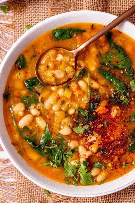 Mar 28, 2023 - This Tuscan white bean soup recipe features Cannellini beans, tender vegetables, and spices, simmered in a flavorful broth. Tuscan White Bean Soup, Tuscan White Bean, White Bean Soup Recipes, Leftovers Soup, Bean Soup Recipes, White Bean Soup, Vegan Soups, White Bean, Dried Beans