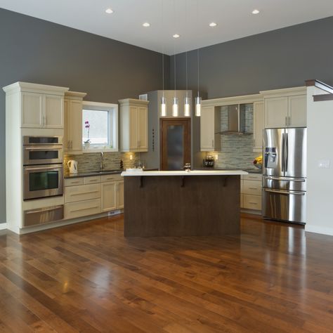 Semi-gloss finish on wooden floor. Satin Vs Semi Gloss, Grey Kitchen Tiles, Glass Mosaic Tile Backsplash, Grey Kitchen Walls, Recess Lighting, Off White Cabinets, Light Hardwood, Gray And White Kitchen, Wood Island