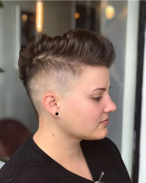 29 Epic Queer & Lesbian Haircuts and Lesbian Hairstyles  Side Part This cut works well for lesbians with thick hair. As the name implies, this short lesbian hairstyle takes a side part and comb over both sections to the side. (Ruby Rose comes to mind as an example!)  lesbian haircut short | lesbian haircut short tomboy style | short lesbian hair haircut tomboy style | lesbian haircut short round face | masc lesbian haircut short round face | lesbian haircut short 2024 Short Lesbian Hair Haircut, Lesbian Short Hair, Dyke Haircut, Lesbian Hair, Lesbian Haircut, Octopus Haircut, Butch Lesbian, Masc Lesbian, Monochrome Makeup