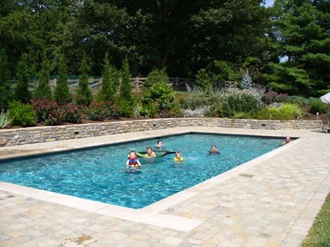 Thinking about a new in ground pool, retaining wall and landscaping? Let Pool Butlers build you these in excellence and quality by our skilled professionals. We can save you thousands right now! 618.251.0041 Pool Area Retaining Wall, Pools With Retaining Walls Sloped Backyard, Pool Retaining Wall, Pool Landscapes, Pool Privacy, Cocktail Pools, Small Retaining Wall, Landscaping Around Pool, Pool Landscaping Ideas