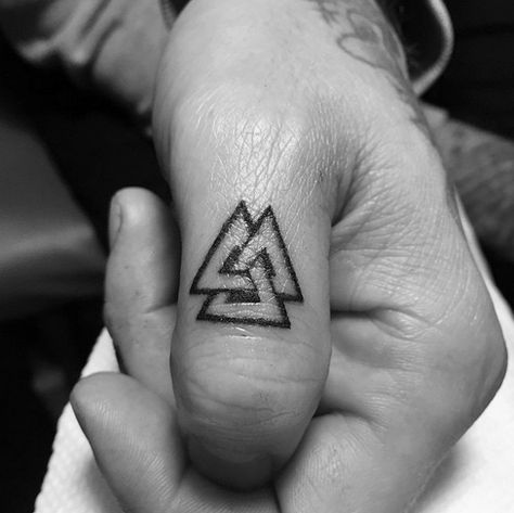 🔺Want Valknut Tattoo Ideas? Here Are The Top 50 Best Valknut Tattoos Men Finger Tattoos, Valknut Tattoo, Runes Tattoo, Triangle Tattoo Meaning, Viking Tattoos For Men, Traditional Viking Tattoos, Herren Hand Tattoos, Thumb Tattoos, Viking Tattoo Symbol