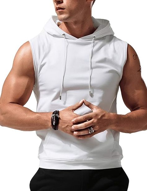 Price: $32.99 #mens #sports #tshirts #gym #gooddeal #amazon PREMIUM MATERIAL:Soft Fabric.breathable and stretchy,sweat-wicking,keep you dry and comfortable. provides maximum moving and breathability during your workout UNIQUE DESIGN:Mens hooded muscle gym shirt is designed for motion freedom,sleeveless design,solid colors,and a practical kangaroo pocket in front can store your belongs,and the fitted and neat cut off ,The elastic ribbed hem design of the top,allows greater mobility in any direct Gym Hoodies, Mens Workout Tank Tops, Tank Top Gym, Men's Workout, Strong Arms, Gym Hoodie, Gym Shirt, Gym Tank Tops, Fall Hoodies