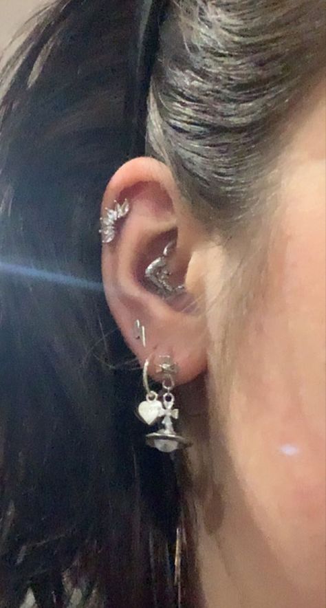 Lots Of Earrings Aesthetic, Silver Earring Stack Aesthetic, Y2k Earrings Aesthetic, Alt Earring Stack, Ear Stack Silver, Vivienne Westwood Earring Stack, Silver Earrings Aesthetic Y2k, Stolen Girlfriends Club, Silver Ear Stack