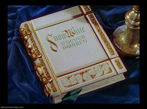 The storybook opening is a recurring theme in several of Disney's films, almost always used as an opening sequence. A similar trait is used for the closings, known as storybook closings. Trivia Although Beauty and the Beast didn't feature an actual storybook opening, it did feature a similar opening where it focused on stained-glass windows at the castle, and the initial draft for the film as written by Linda Woolverton featured an actual storybook opening similar to that of Snow Whit... Snow White Book, Disney Storybook, Disney Movies To Watch, Fairest Of Them All, First Animation, Snow White And The Seven Dwarfs, Disney Books, The Seven Dwarfs, Seven Dwarfs