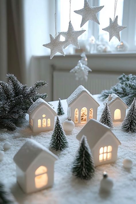 Transform your space with enchanting Christmas home decor. These cozy miniature houses and snowy accents create a winter wonderland feeling. Perfect for the holiday season! #ChristmasHomeDecor #WinterWonderland #FestiveVibes Small White Houses Christmas Decor, Winter Wonderland Village, Winter Wonderland Decorations House, White Village Christmas Houses, White Ceramic Houses Christmas, White Christmas Village Display, Winter Wonderland Decorations Christmas, Home Kitchen Decor Ideas, Winter Wonderland Christmas Decorations