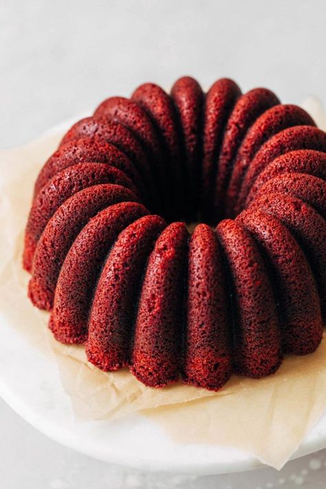 This moist red velvet bundt cake is rich and so flavorful. It has that signature mild chocolate flavor, tender texture, and deep red velvet color. All topped off with a silky cream cheese icing! #redvelvet #bundtcake #creamcheese #butternutbakery | butternutbakeryblog.com Cakes Red Velvet, Red Velvet Cake Recipe Easy, Red Velvet Bundt, Mini Bundt Cakes Recipes, Red Velvet Bundt Cake, Cake Brownie, Bolo Red Velvet, Red Velvet Recipes, Nothing Bundt