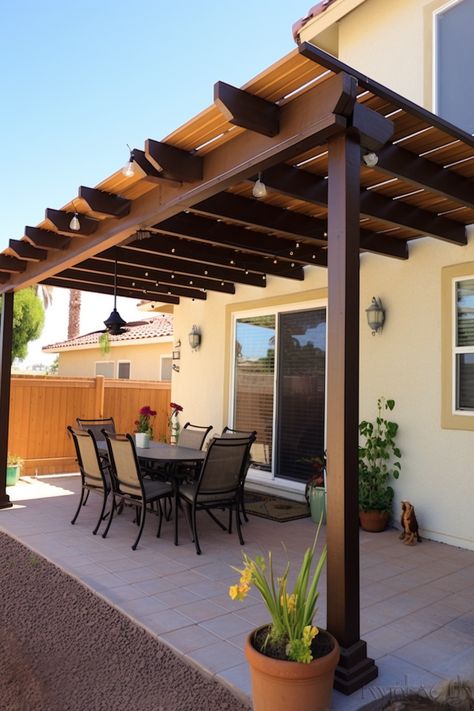 Transform your backyard into a cozy retreat with a dark brown and light amber outdoor pergola. Decorate with glowing lights for a touch of magic. Perfect for enjoying meals al fresco in a Spanish school, prairiecore, sculpted, cottagecore style. Diy Covered Patio, Diy Patio Cover, Spanish School, Outdoor Dining Spaces, Cottagecore Style, Outdoor Pergola, Dining Space, Covered Patio, Outdoor Dining