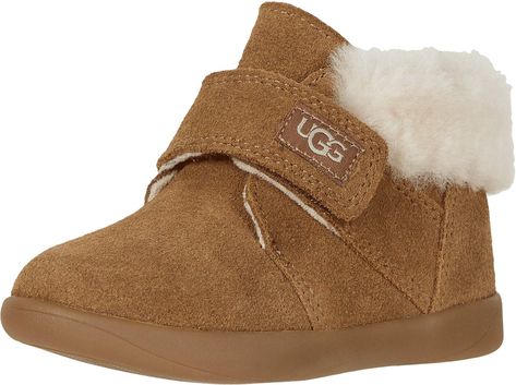 PRICES MAY VARY. Suede upper Exposed 10mm sheepskin collar Adjustable hook and loop closure Microfiber lining Flexible, lightweight molded rubber outsole Toddler Uggs, Baby Ugg Boots, Baby Uggs, Toddler Boots, Kids Uggs, Small Baby, Hook And Loop, Ugg Shoes, Ugg Boots