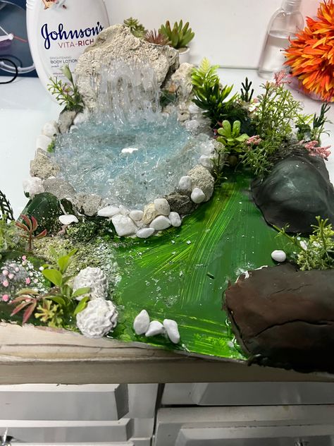 My school diy waterfall model Waterfall Model, Waterfall Diy, Biomes Project, Rainforest Biome, Waterfall Project, Diy Waterfall, Model School, Acrylic Painting Diy, Best Poses For Photography