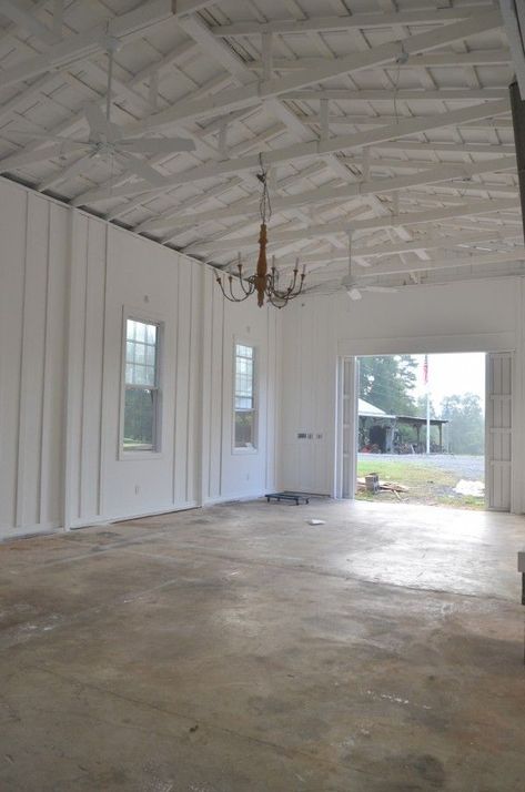 Board And Batten Garage Interior, White Garage Interior, Barn Walls Ideas, Farmhouse Garage Interior, Barn Ceiling Ideas, Pole Barn Interior Ideas, Painted Osb, White Metal Ceiling, Batten Walls