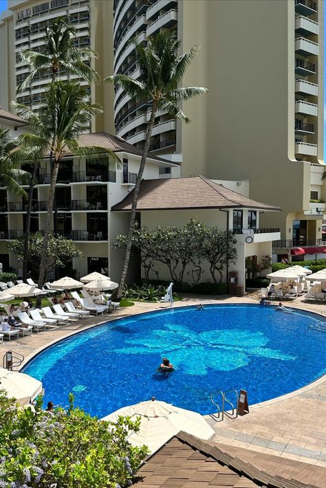 Behold: the stunning Orchid Pool, one of Halekulani's most beloved features. Comprised of 1.2 million pieces of glass tile, the iconic orchid mosaic at the bottom of the pool is a masterpiece in and of itself. Guests can enjoy full access to the pool along with personalized poolside service and unobstructed views of the stunning Waikiki landscape. For more info, please visit: https://www.halekulani.com/facilities/pool/ 📷: @halekulani_at_home via IG Halekulani Hotel, Waikiki Hawaii, Hawaii Hotels, Luxurious Rooms, Five Star Hotel, Shades Of White, Glass Tile, The Pool, Best Hotels