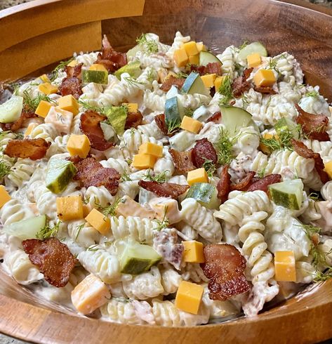 A decadent pasta salad filled with bacon, dill pickles and cheese and flavored with a creamy ranch sauce that everyone loves! Pickle Pasta Salad Recipe, Creamy Ranch Sauce, Pickles And Cheese, Pickle Pasta Salad, Pickle Pasta, Bacon Pasta Salad, Dill Pickle Pasta Salad, Bacon Ranch Pasta, Bacon Ranch Pasta Salad