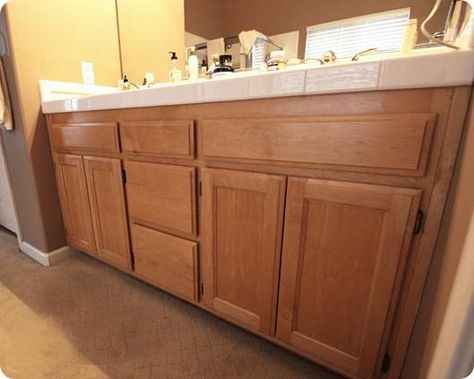 Turn Your Builder's Grade Oak Vanity Into a Thing of Beauty - want to do this in our kitchen.... Vanity Redo, Upgrade Kitchen, Bathroom Vanity Organization, Room Vanity Ideas, Redo Cabinets, Oak Bathroom Vanity, Oak Vanity, Painting Oak Cabinets, Vanity Makeover