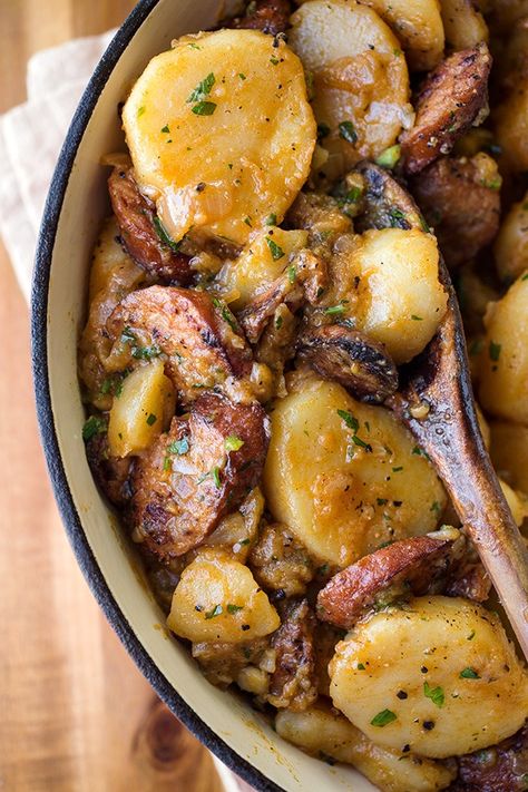 This saucy Hungarian red potato goulash is brimming with beef smoked sausage, red potatoes and caramelized onions in a savory, rustic sauce! | thecozyapron.com #saucyhungarianredpotatogoulash #redpotatogoulash #hungarianredpotatogoulash #sausageandredpotatogoulash Brusetta Appetizer, Potato Goulash, Recipe With Potatoes, Potato Sausage, Smoked Sausage Recipes, Goulash Recipe, Red Potato, Caramelized Onion, Kielbasa