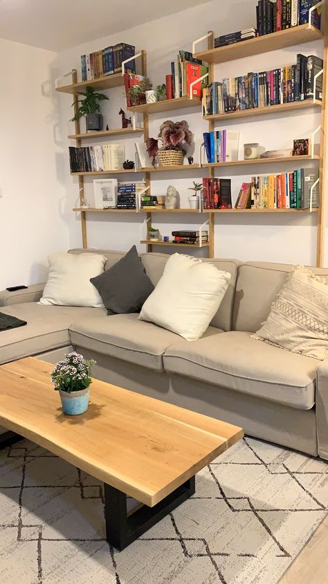 Wall Storage Behind Couch, Living Room Bookshelves Behind Sofa, Behind Couch Bookshelf, Bookshelf Over Couch, Bookshelves Over Couch, Books Above Couch, Bookshelves Above Sofa, Bookshelf Behind Couch Ideas, Above Couch Shelves