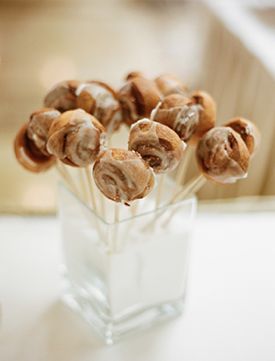 mini cinnamon rolls on sticks very cute and fun for a desert table at a wedding Mini Cinnamon Buns, Bridal Brunch Food, Wedding Finger Foods, Baby Shower Brunch Food, Wedding Brunch Reception, Mini Cinnamon Rolls, Brunch Cake, Brunch Desserts, Mini Rolls