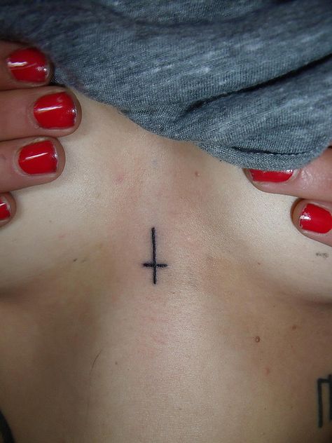 a cross the universe Cross Between Chest Tattoo, Upside Down Cross, Forearm Tattoo Quotes, Small Chest Tattoos, Occult Tattoo, Chest Tattoos For Women, Poke Tattoo, Cross Tattoo, Chest Tattoo