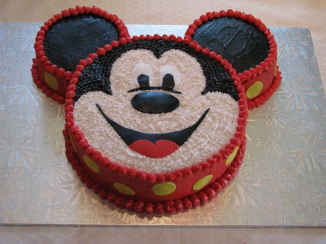 Mickey Mouse cake - Thanks to CareyI for the idea/inspiration.  Buttercream icing with fondant yellow polka dots, and facial features.  Cake is 8inch for face and then I used 2 corningware dishes that are about 3.5-3.75inch for the ears Mickey Mouse Face Cake, Bolo Do Mickey Mouse, Cupcakes Minnie Mouse, Γενέθλια Mickey Mouse, Mickey Mouse Face, Mouse Birthday Cake, Mickey Mouse Bday, Mickey Mouse Birthday Cake, Face Cake