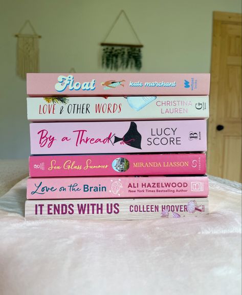 Pink book stack, book aesthetic, reading aesthetic, by a thread lucy score, love on the brain ali hazelwood, love & other words christina lauren, it ends with us colleen hoover, float kate marchant By A Thread Lucy Score Book Cover, Christina Lauren Love And Other Words, By A Thread Lucy Score Book, Float Book Aesthetic, By A Thread Lucy Score Aesthetic, Float Kate Marchant, By A Thread Lucy Score, Book Stacks Aesthetic, Pink Book Aesthetic