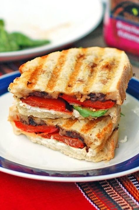 This red pepper and goat cheese panini has a layer of olive tapenade topped with roasted red pepper and soft, creamy goat cheese. Grilled perfection! | pinchofyum.com Tapenade Sandwich, Panini Party, Panini Ideas, Red Pepper Goat Cheese, Veggie Sandwiches, Panini Recipe, Cheese Panini, Panini Maker, Pinch Of Yum